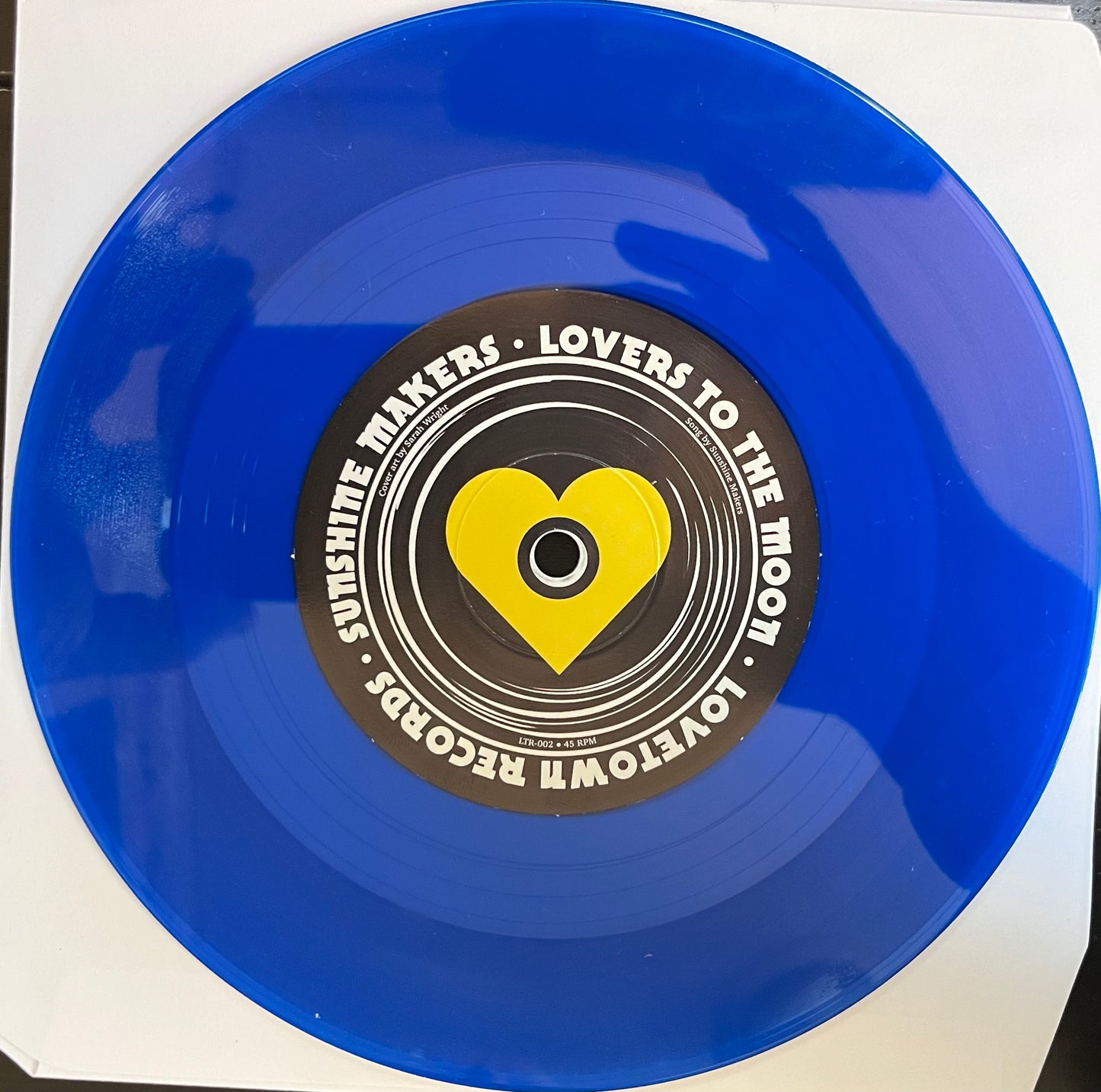 Limited Edition 7-inch Translucent Blue Vinyl Record - Sunshine Makers, Lovers To The Moon / Shebad, Payshunce (Jasa Remix)